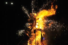 Scarecrow burns on the Freedom Square in winter