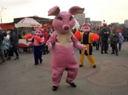 Animators in costumes of piglets