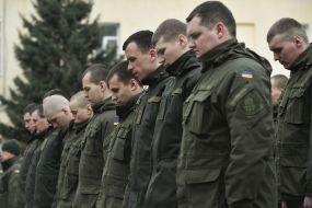 The servicemen give honor to the dead