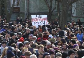 A poster in a crowd of people