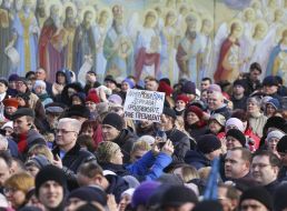 A poster in a crowd of people