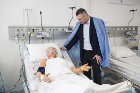Vitali Klitschko communicates with the sick
