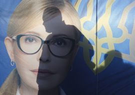 The shadow of a man on a campaign tent