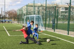 Schoolchildren play football
