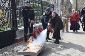 Woman with fire extinguisher