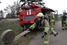 The cadet develops a fire hose
