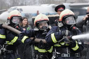 Caucasian girls quench a conditional fire