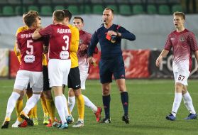 Alexandr Derdo shows a red card