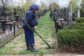 Pyrotechnist checks the graveyard for ammunition