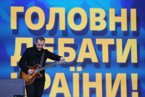 Musician on stage at the NSC "Olimpiyskiy" before the debates begin