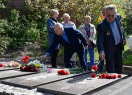 Laying flowers on the alley with busts of Heroes of Chernobyl