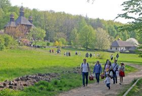 People carry Easter baskets