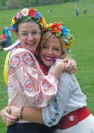 Girls in embroidery and wreaths
