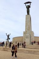 Tourists near the Statue of Liberty on Mount Gellert