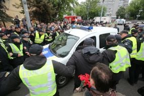 Law enforcers help drive a car
