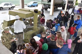 People stand in line for soldier's porridge