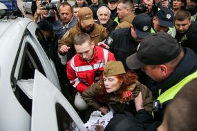 Law enforcers arrested a woman in a military uniform with prohibited symbolism
