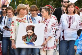 Participants of the March of vyshyvankov hold a portrait of Taras Shevchenko