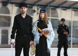 Man and woman in Crimean Tatar costumes