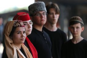 Participants in theatrical production in Crimean Tatar costumes