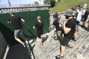 The activists destroy the fence