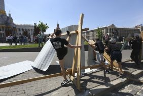The activists destroy the fence