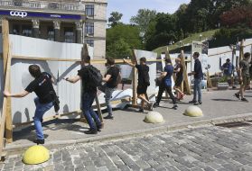The activists destroy the fence