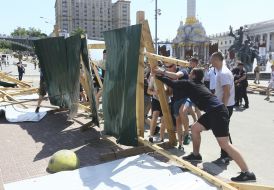 The activists destroy the fence