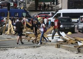 The activists destroy the fence