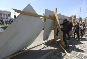 The activists destroy the fence