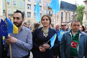 Participants in the opening ceremony of the symbolic street sign