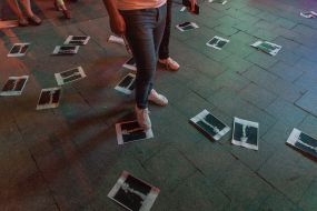 Pictures of Vladimir Putin on the sidewalk