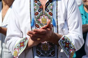 Embroidery with a trident on a man