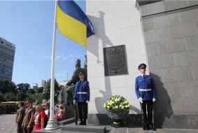 Guard of honor near the memorial plaque in honor of the dead soldiers