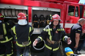 Rescuers are preparing to quench a conditional fire