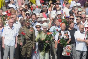 Participants of the ceremony of laying flowers