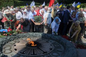 Participants of the ceremony of laying flowers