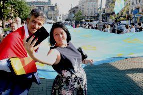 Participants of the procession with the Crimean Tatar flag