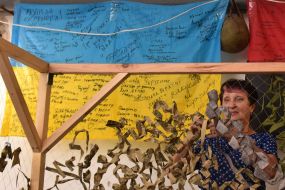 Activists make camouflage nets