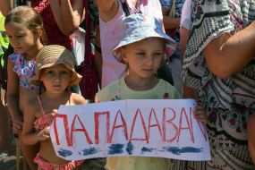 Girl with a poster