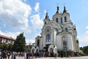 Men bring a coffin to the Holy Virgin Cathedral