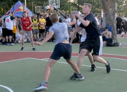 Students play street basketball