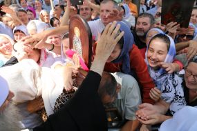 Priest and believers