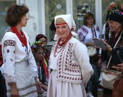 The participants of the procession of ancient embroidery in Ukrainian national costumes