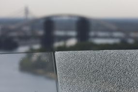 Cracked section side Windows on the pedestrian-Bicycle bridge