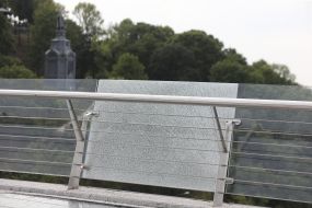 Cracked section side Windows on the pedestrian-Bicycle bridge