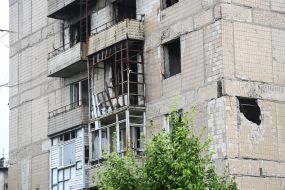 Destroyed by shelling the nine-floor house