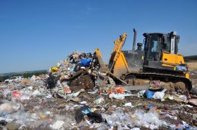 Tractor ramming trash