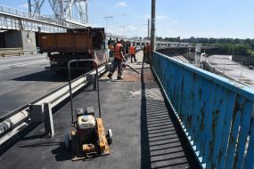 Ремонт дороги на греблі Дніпрогесу