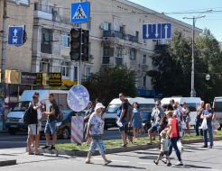 Pedestrians cross the road